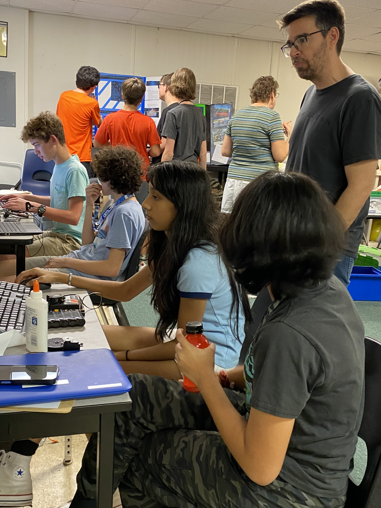 Student measuring components precisely