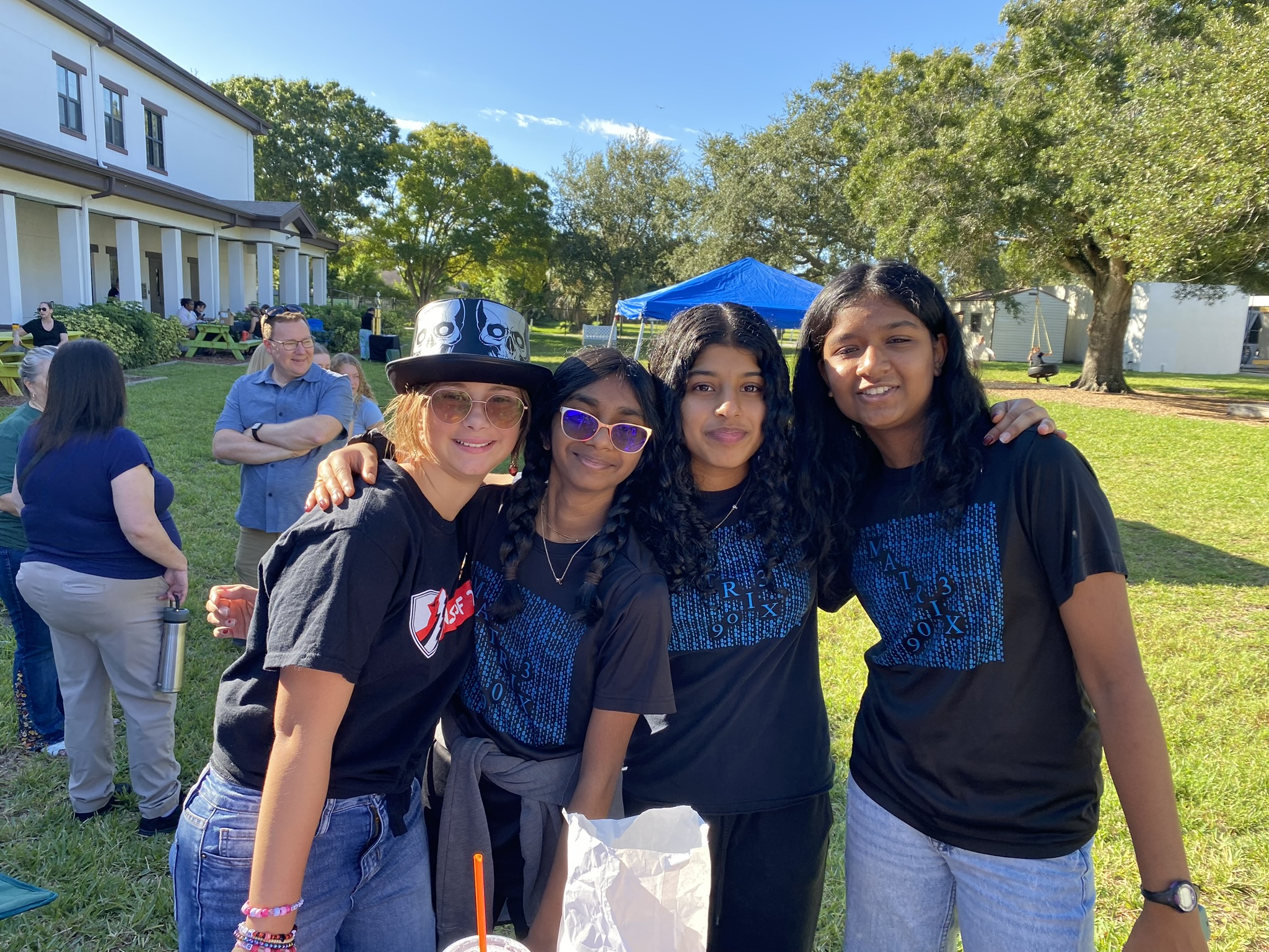 Students inspecting parts and fasteners