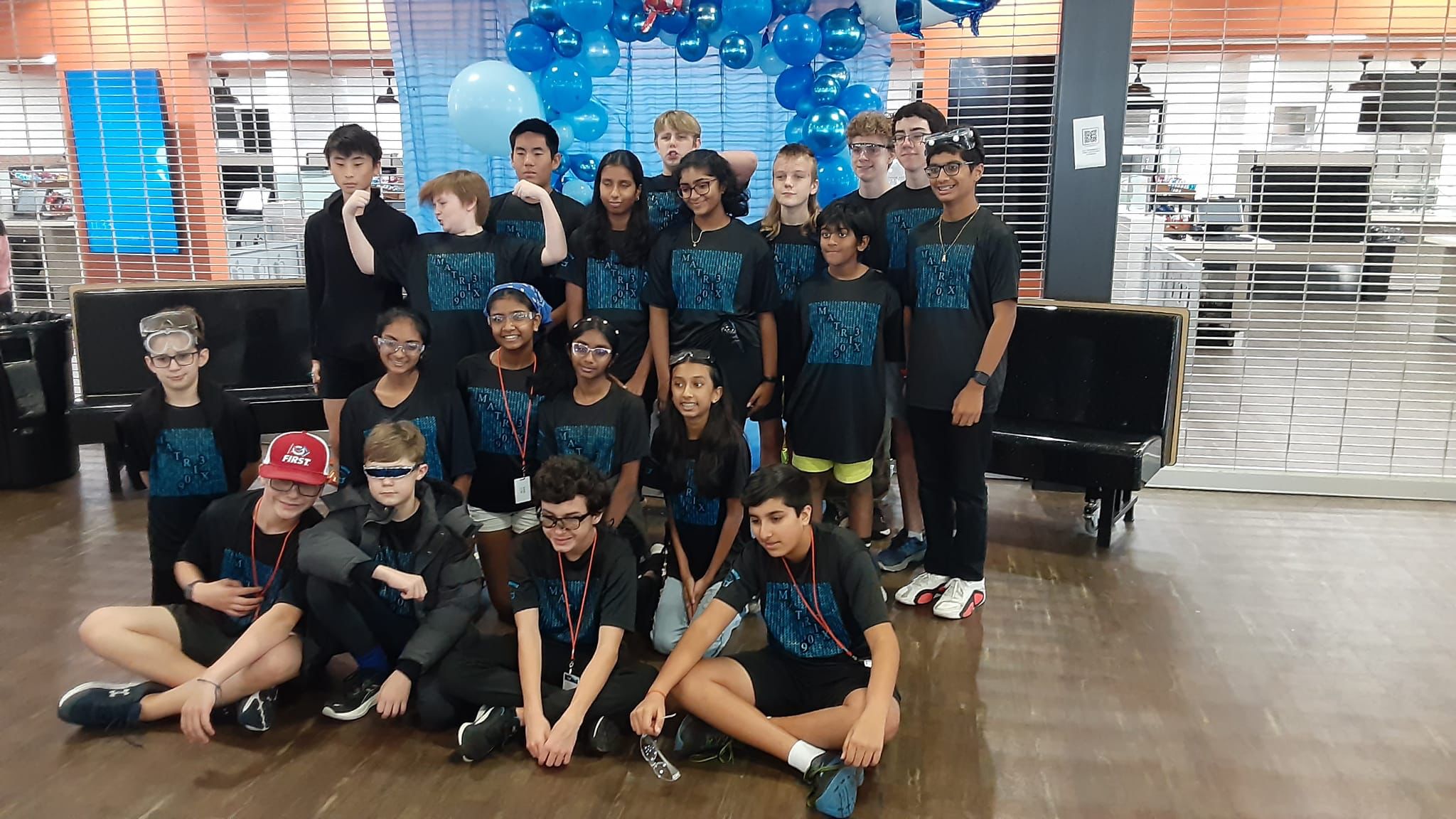 Team test-driving robot on field